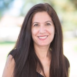 Tammy, Practice Manager at Axelrode Orthodontics, smiling in professional portrait